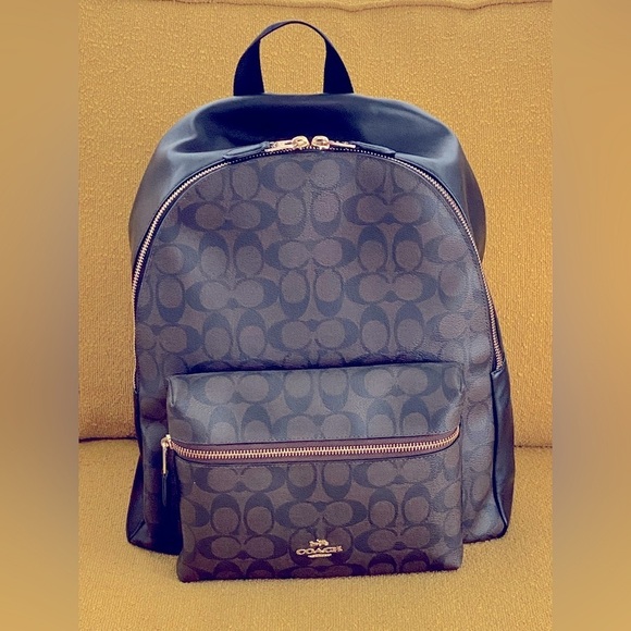 Coach Handbags - Coach Signature Black & Brown Charlie Medium Backpack EUC